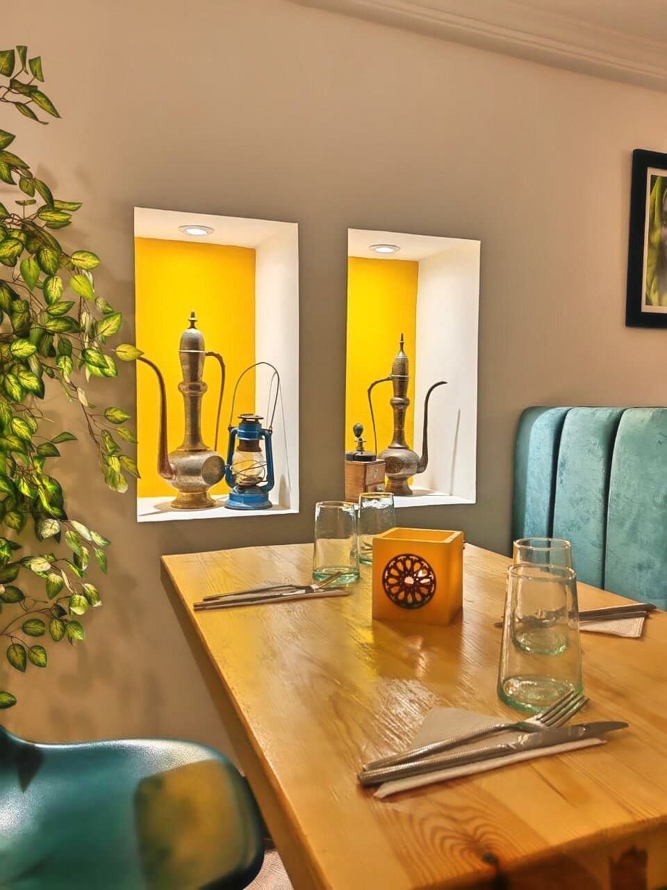 Brass teapots in a saffron niche